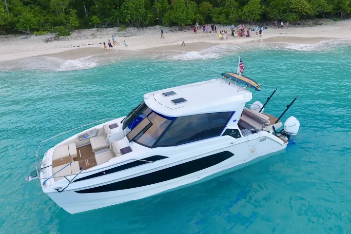 Private boat in clear water in the Virgin Islands