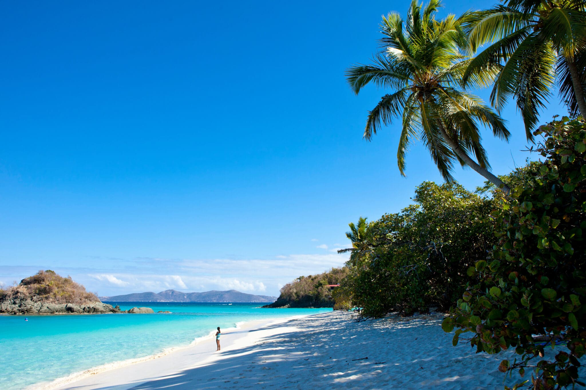 trunk bay beach in the caribbean with one person