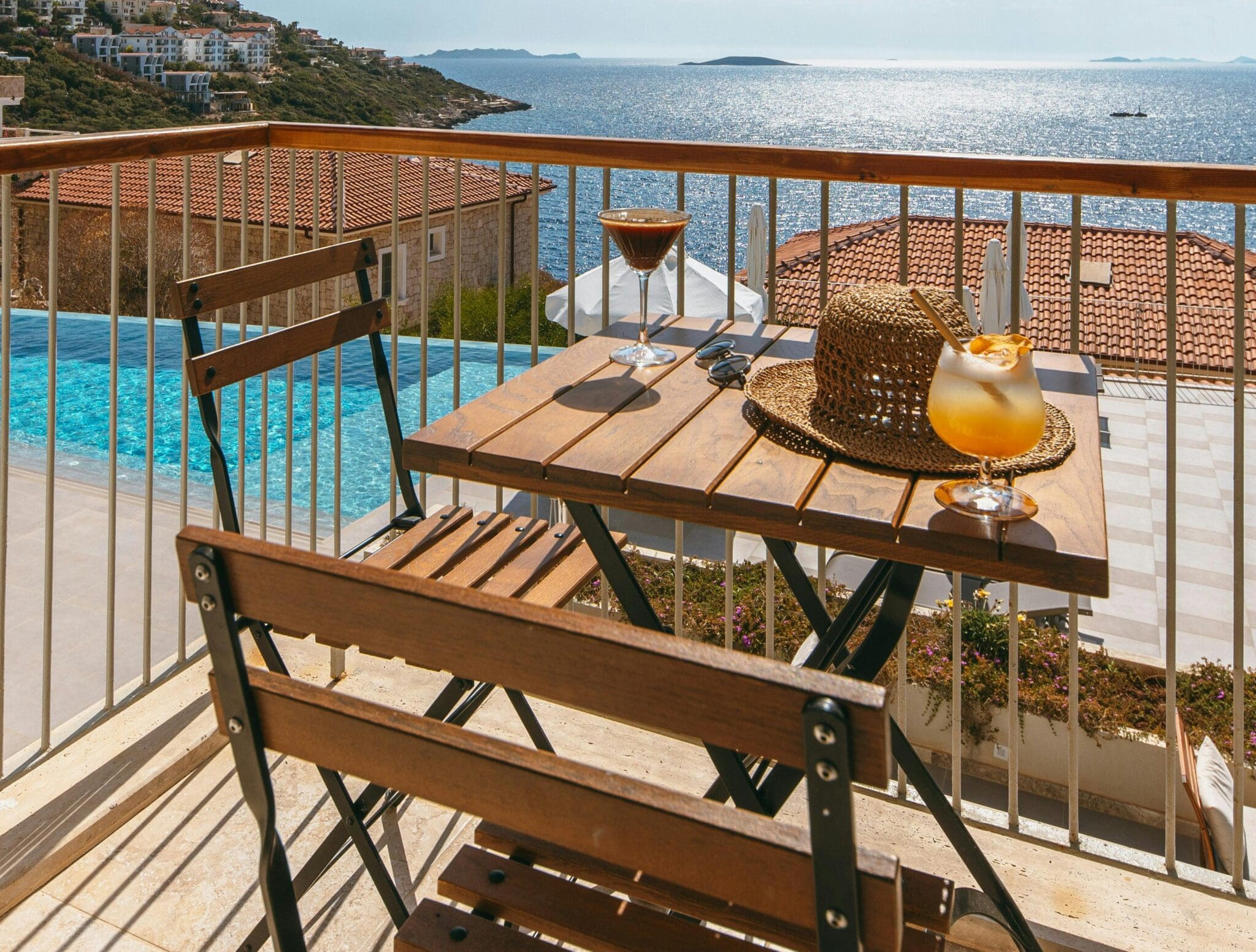 Patio table and chairs overlooking the ocean